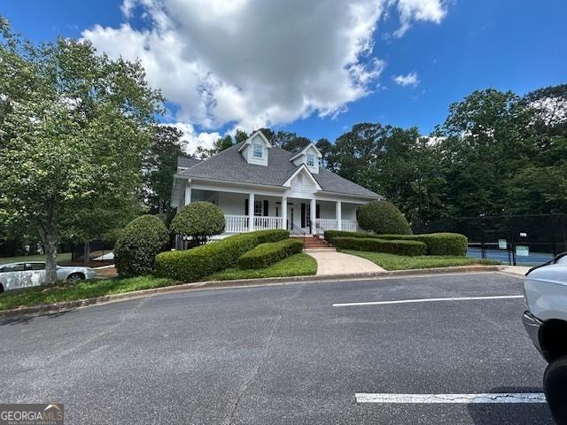 4665 Oakmont Bend Dr, Alpharetta, GA 30004 - view of front of property featuring a porch and uncovered parking