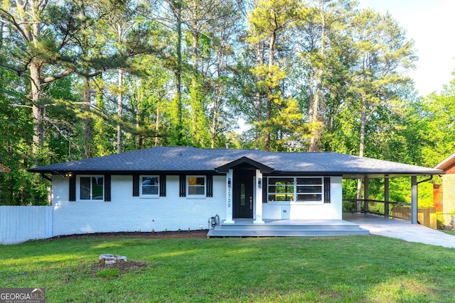 2720 Cavalier Dr, Decatur, GA 30034 - single story home featuring driveway, fence, an attached carport, and a front lawn