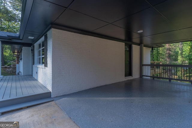 2720 Cavalier Dr, Decatur, GA 30034 - wooden terrace featuring an attached carport
