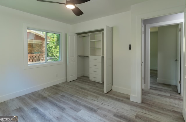 2720 Cavalier Dr, Decatur, GA 30034 - unfurnished bedroom with baseboards, light wood-type flooring, a ceiling fan, and a closet