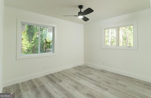 2720 Cavalier Dr, Decatur, GA 30034 - unfurnished room featuring a ceiling fan, light wood-style flooring, and baseboards