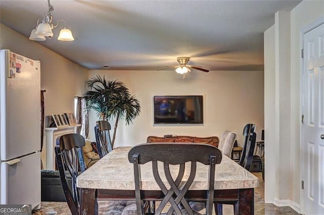 dining room with ceiling fan