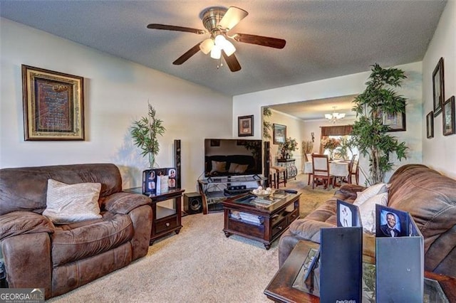 carpeted living area with a textured ceiling, vaulted ceiling, and ceiling fan with notable chandelier