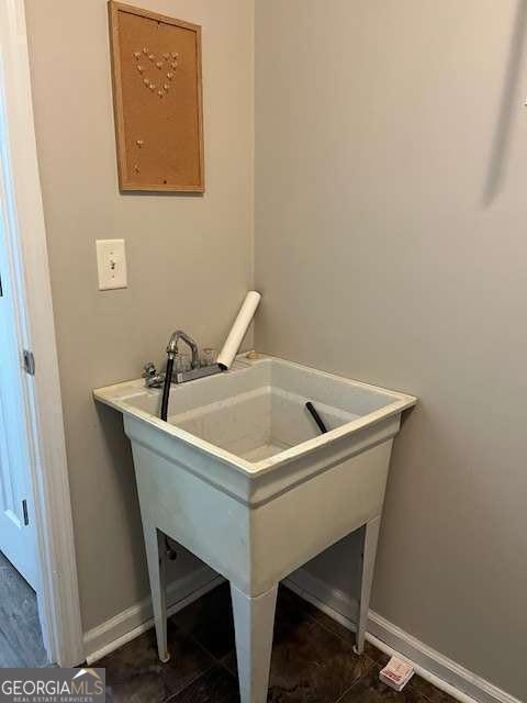 220 Rehobeth Way, Fayetteville, GA 30214 - bathroom with baseboards and a sink