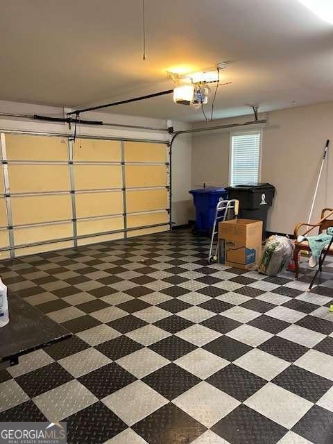 220 Rehobeth Way, Fayetteville, GA 30214 - garage with a garage door opener