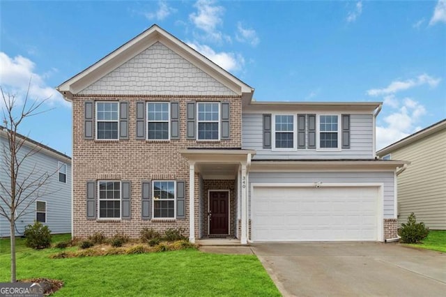 340 Paulownia Cir, Mcdonough, GA 30253 - view of front facade featuring a front yard, driveway, an attached garage, and brick siding