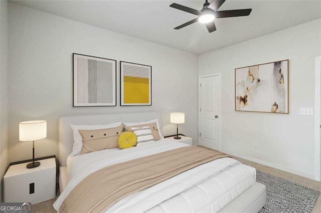 340 Paulownia Cir, Mcdonough, GA 30253 - carpeted bedroom with a ceiling fan and baseboards