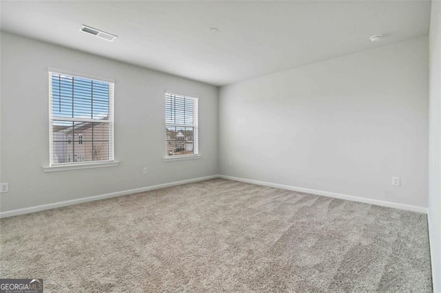 340 Paulownia Cir, Mcdonough, GA 30253 - carpeted empty room featuring baseboards and visible vents