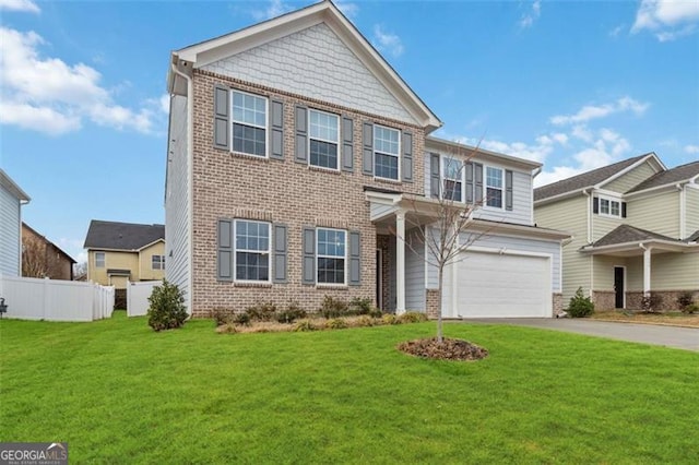 340 Paulownia Cir, Mcdonough, GA 30253 - view of front of home with brick siding, fence, driveway, a front lawn, and an attached garage