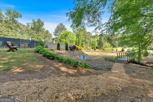 view of yard with fence