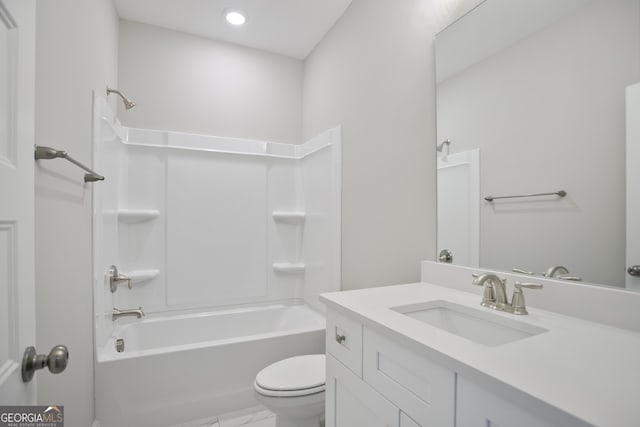 bathroom with vanity, toilet, and bathing tub / shower combination