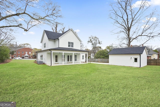 back of house with a lawn, fence, cooling unit, and a patio