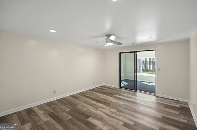 unfurnished room with recessed lighting, ceiling fan, wood finished floors, and baseboards