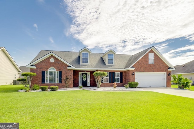 view of front of property with a front lawn, concrete driveway, an attached garage, and brick siding