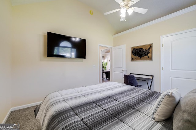 bedroom with crown molding, carpet flooring, ceiling fan, baseboards, and vaulted ceiling