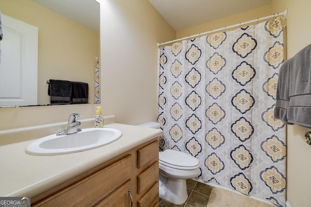 full bathroom with tile patterned floors, a shower with shower curtain, toilet, and vanity