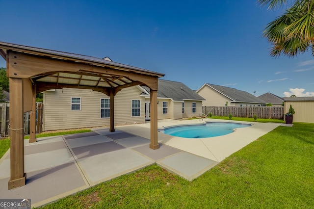 view of swimming pool featuring a patio area, a fenced in pool, a fenced backyard, a lawn, and a gazebo