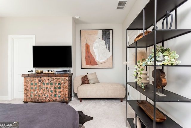 bedroom featuring visible vents and carpet