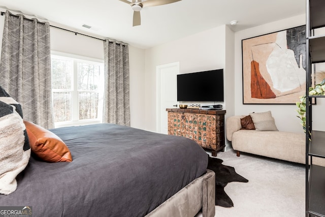 bedroom featuring visible vents and a ceiling fan
