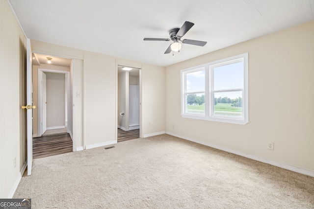 8490 Belton Bridge Rd, Lula, GA 30554 - unfurnished bedroom with a ceiling fan, visible vents, carpet floors, and baseboards
