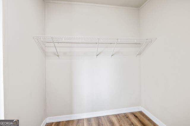 8490 Belton Bridge Rd, Lula, GA 30554 - walk in closet featuring wood finished floors