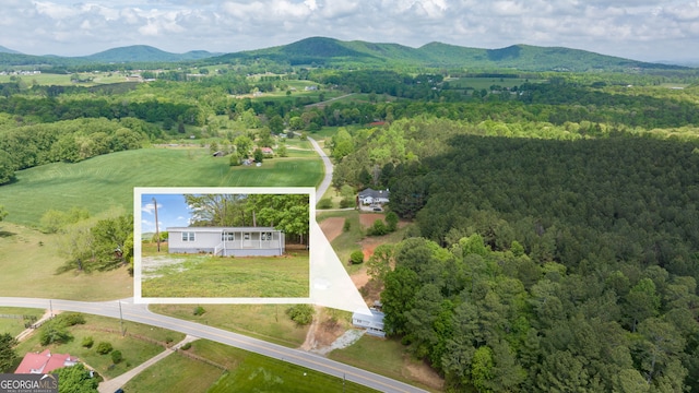 8490 Belton Bridge Rd, Lula, GA 30554 - drone / aerial view featuring a mountain view and a view of trees
