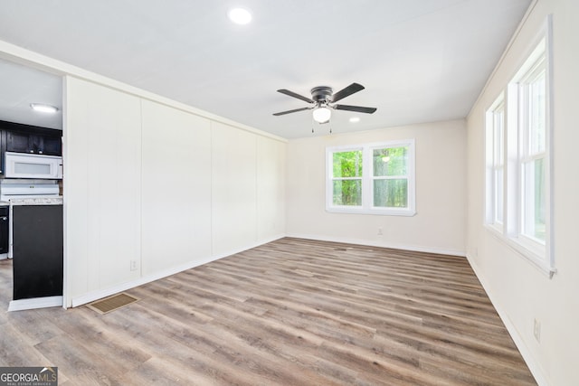 8490 Belton Bridge Rd, Lula, GA 30554 - interior space featuring visible vents, baseboards, recessed lighting, wood finished floors, and a ceiling fan