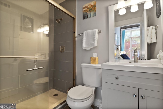 110 Barnard St, Savannah, GA 31401 - bathroom with toilet, a shower stall, and vanity