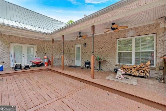 deck featuring a ceiling fan and french doors