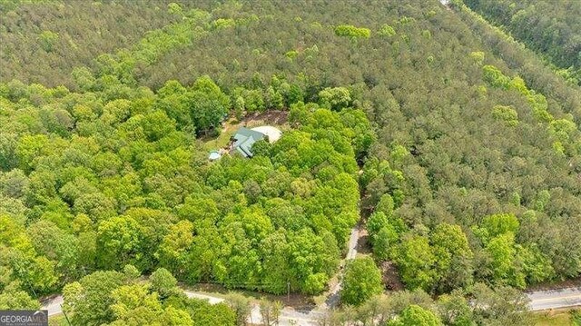 drone / aerial view with a forest view