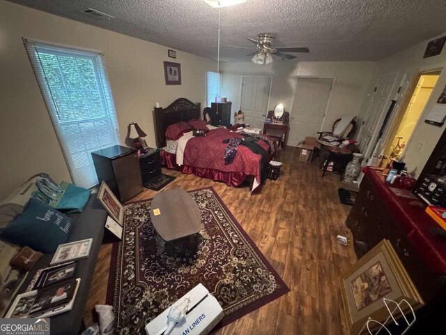 115 Sarsen Cir, Bogart, GA 30622 - bedroom featuring wood finished floors and a textured ceiling
