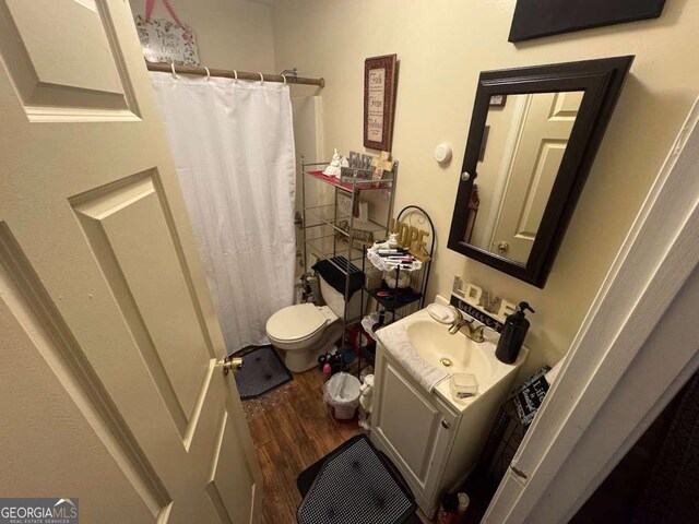 115 Sarsen Cir, Bogart, GA 30622 - full bath with vanity, wood finished floors, and a shower with shower curtain