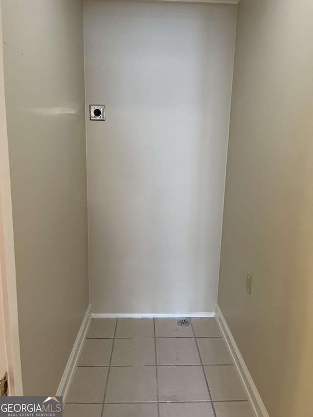 106 Zenith St, Dublin, GA 31021 - washroom featuring tile patterned floors, electric dryer hookup, laundry area, and baseboards