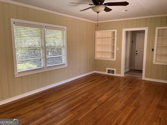 106 Zenith St, Dublin, GA 31021 - spare room with ornamental molding, visible vents, ceiling fan, and built in features