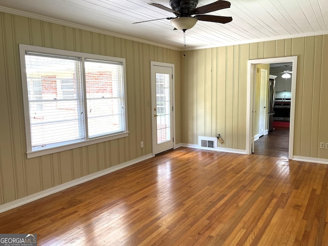 106 Zenith St, Dublin, GA 31021 - unfurnished room featuring hardwood / wood-style floors, ceiling fan, and crown molding