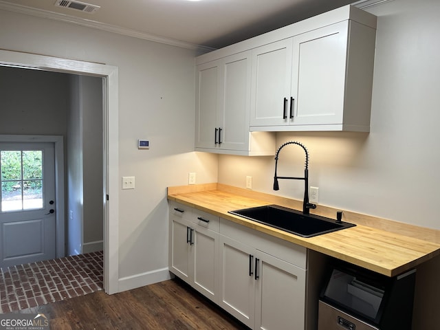 106 Zenith St, Dublin, GA 31021 - kitchen with a sink, visible vents, baseboards, butcher block countertops, and dark wood finished floors
