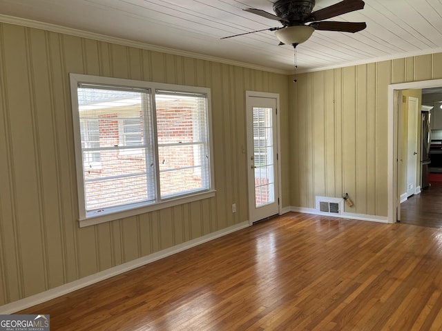 106 Zenith St, Dublin, GA 31021 - unfurnished room featuring a ceiling fan, visible vents, a wealth of natural light, and wood finished floors