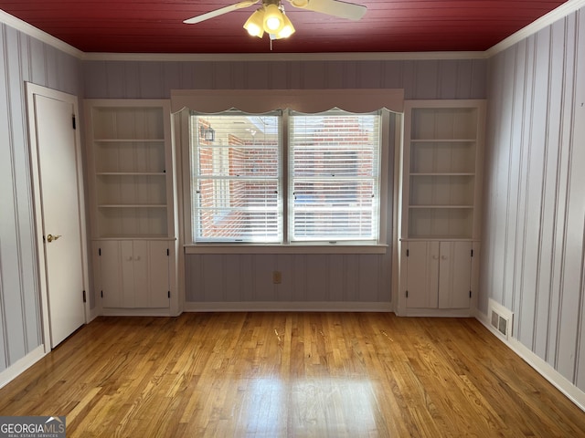 106 Zenith St, Dublin, GA 31021 - interior space with ornamental molding, wood ceiling, visible vents, and light wood-style floors
