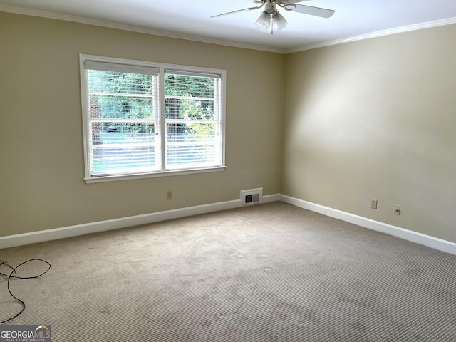 106 Zenith St, Dublin, GA 31021 - carpeted spare room featuring ceiling fan, crown molding, visible vents, and baseboards