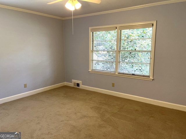 106 Zenith St, Dublin, GA 31021 - spare room featuring carpet flooring, a ceiling fan, visible vents, baseboards, and ornamental molding