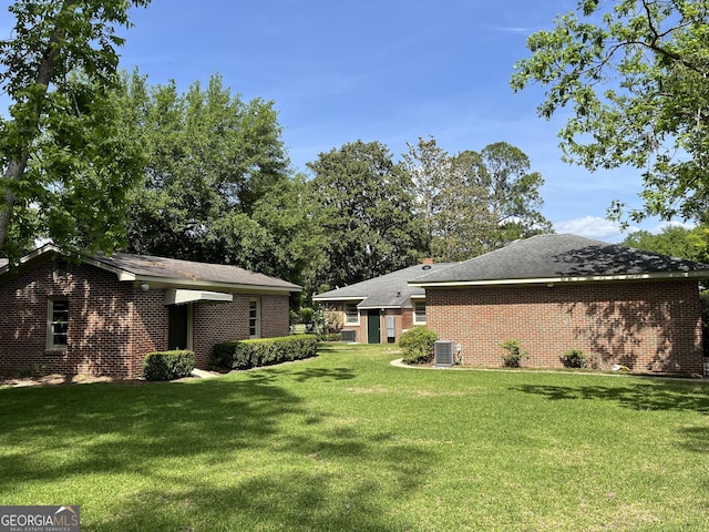 106 Zenith St, Dublin, GA 31021 - view of yard with central AC unit