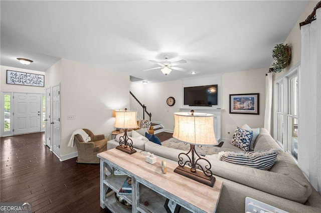 9310 Old Preserve Trl, Ball Ground, GA 30107 - living room featuring baseboards, a ceiling fan, and dark wood-style flooring