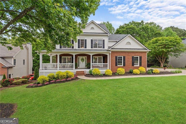 9310 Old Preserve Trl, Ball Ground, GA 30107 - view of front of property with a porch, a front yard, and brick siding