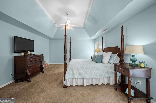 9310 Old Preserve Trl, Ball Ground, GA 30107 - bedroom featuring light colored carpet, vaulted ceiling, a tray ceiling, and ceiling fan