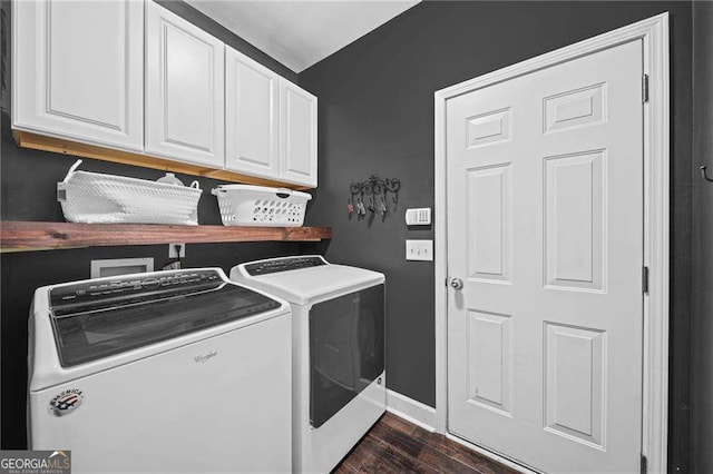 9310 Old Preserve Trl, Ball Ground, GA 30107 - clothes washing area featuring cabinet space, baseboards, washing machine and dryer, and dark wood-type flooring
