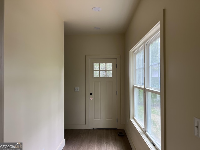 135 Church St, Palmetto, GA 30268 - doorway with wood finished floors and baseboards