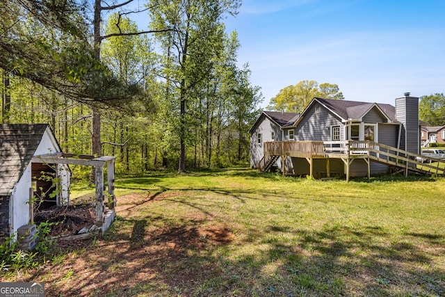 view of yard with a deck