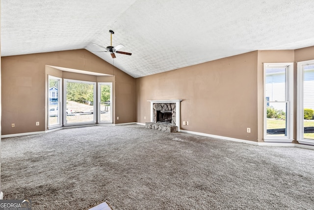 unfurnished living room featuring baseboards, ceiling fan, and carpet