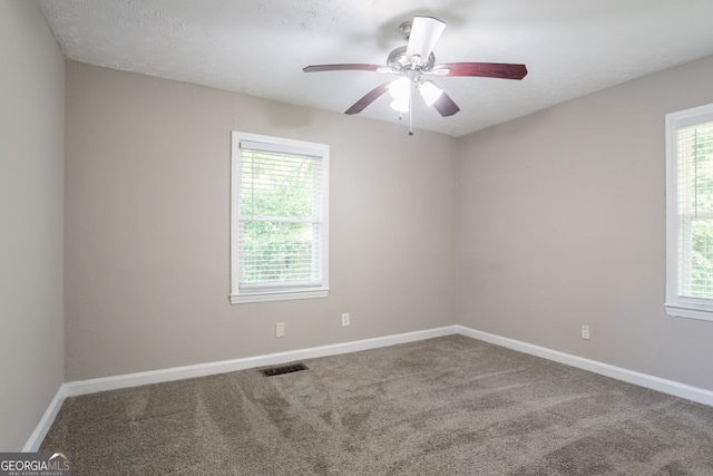 2041 W Flat Shoals Ter, Decatur, GA 30034 - unfurnished room with a ceiling fan, visible vents, carpet, and baseboards