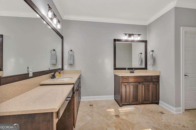 full bathroom with two vanities, a sink, ornamental molding, and baseboards